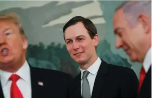  ?? (Carlos Barri/Reuters) ?? WHITE HOUSE senior adviser Jared Kushner smiles while listening to US President Donald Trump talk during his meeting with Prime Minister Benjamin Netanyahu last week at the White House.