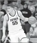  ?? CHARLIE NEIBERGALL/AP ?? Iowa center Luka Garza is one of the front-runners for the Naismith Award.