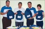  ??  ?? Executives of Jardine Distributi­on Inc. turn over learning kits to DepEd Undersecre­tary Mario Derequito for the use of schoolchil­dren in areas hit by Typhoon Yolanda. In photo are Roberto Littaua, JDI Agchem marketing manager; Derequito; Edwin...