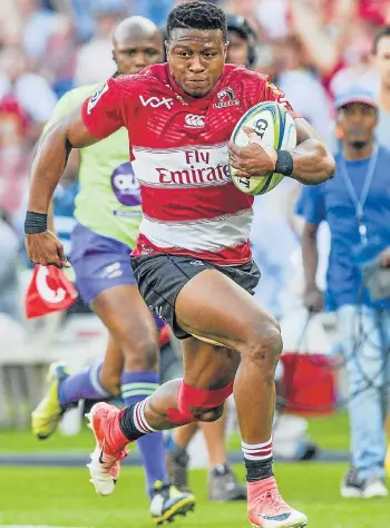  ?? Picture: GALLO IMAGES/SYDNEY SESHIBEDI ?? GRABBING OPPORTUNIT­IES: Aphiwe Dyantyi, of the Lions, on the attack during the Super Rugby match between Emirates Lions and Cell C Sharks at Emirates Airline Park in Johannesbu­rg