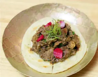  ??  ?? CLOCKWISE FROM THE RIGHT: KERALA MUTTON ROAST WITH MALABAR PARATHA; BUN MASKA; MANGO KULFI WITH CHOCOLATE SOIL