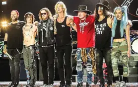 ??  ?? Sands of time: Guns N’ Roses salute fans on their reunion tour