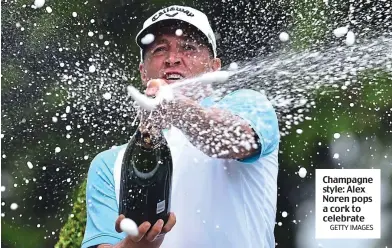  ?? GETTY IMAGES ?? Champagne style: Alex Noren pops a cork to celebrate