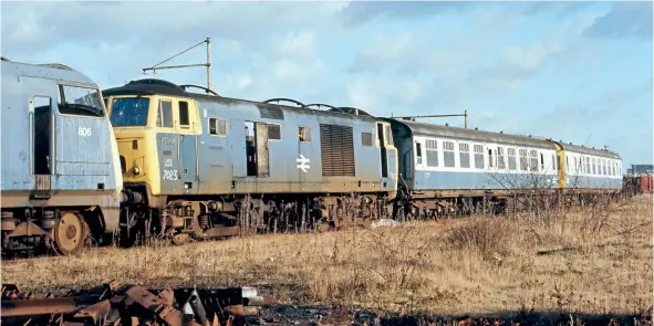  ??  ?? No. D7023 was withdrawn in June 1973 from Old Oak Common and broken up at Swindon in May 1975, where it is pictured awaiting its fate with 'Warship' No. D806 and a pair of Class 126 DMU vehicles withdrawn from use in Scotland.