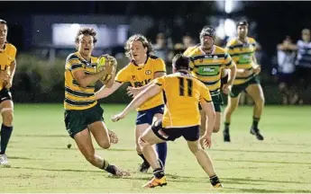  ?? Photo: Nev Madsen ?? COMING THROUGH: Will Walton on the attack for Darling Downs during their Cattleman’s Cup victory last Saturday night over Central Queensland at Highfields Sports Complex.