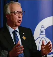  ?? CP PHOTO ?? B.C. Conservati­ve Party leader John Rustad speaks to members of the media during a year-end availabili­ty at legislatur­e in Victoria on Dec. 6.