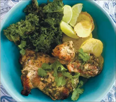  ?? A LITTLE YUMMINESS ?? This easy cilantro chicken, potatoes and kale dinner is cooked on a single sheet pan, making cleanup a breeze.