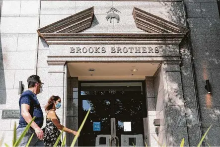  ?? Bloomberg file photo ?? Authentic Brands Group and Simon Property Group have offered $305 million to buy Brooks Brothers Group out of bankruptcy, and WHP Global is preparing a bid. Brooks Brothers has 500 stores worldwide, with 200 in North America.