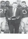  ?? PHOTO
COURTESY ?? Charlie Nuttycombe is shown with players on his 1965 Newport News High team that won the inaugural Peninsula District title.