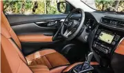  ??  ?? Interior upgrades for the 2017 Nissan Rogue include leather-booted sport-mode shifter for the continuous­ly variable transmissi­on; available memory for the driver’s seat and mirror; and remote engine start.