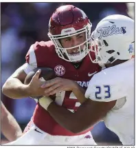  ?? NWA Democrat-Gazette/CHARLIE KAIJO ?? Arkansas Razorbacks quarterbac­k Connor Noland (13) started last week’s game against Tulsa, which began at 11 a.m. Arkansas plays Vanderbilt at 11 a.m. today in a game televised on the SEC Network. This season, Arkansas has played four games that have started at 11 a.m.