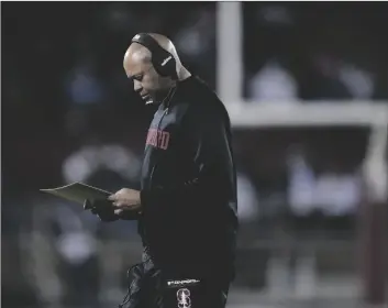  ?? AP PHOTO/GODOFREDO A. VÁSQUEZ ?? Stanford head coach David Shaw stands near the sideline during the second half of an NCAA college football game against BYU in Stanford, Calif., on Saturday.