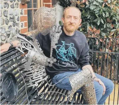  ?? ?? John Gillespie with his artwork before its installati­on in Chichester city centre