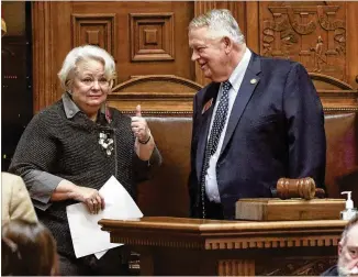  ?? PHOTOS BY BOB ANDRES / ROBERT.ANDRES@AJC.COM ?? Rep. Mary Margaret Oliver, D-Decatur, conferring with House Speaker David Ralston last month, favors legislatio­n aimed at fixing the relatively minor issue that forced the DeKalb County ethics board into a holding pattern.