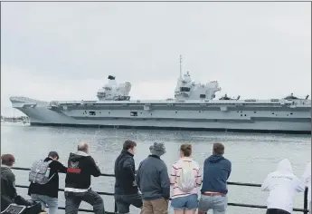  ?? Photo by Finnbarr Webster/Getty Images ?? WATER SIGHT Aircraft carrier HMS Prince of Wales departs from the dock on June 6, 2021 in Portsmouth