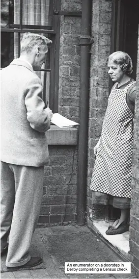  ??  ?? An enumerator on a doorstep in Derby completing a Census check