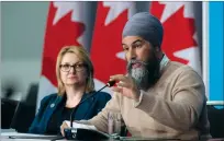  ?? CP PHOTO ADRIAN WYLD ?? Canadian Labour Congress president Bea Bruske listens as NDP Leader Jagmeet Singh speaks to members of the Canadian Labour Congress in Ottawa on Thursday.