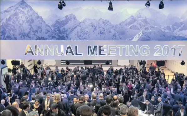  ??  ?? NETWORKING: A general view of the crowd on the first day of the 47th annual meeting of the World Economic Forum in Davos, Switzerlan­d, on Tuesday. The meeting brings together business leaders, political leaders and select intellectu­als to discuss the...