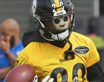  ?? Peter Diana/Post-Gazette ?? THE MAN INSIDE THE MAN OTAs give Cam Sutton the opportunit­y to show off his new horror-themed visor. The visor features a sticker of the blood-spattered hockey goalie mask synonymous with the “Friday the 13th” film franchise.