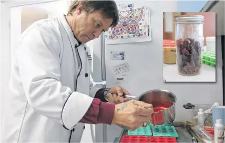  ?? MILLICENT MCKAY/JOURNAL PIONEER ?? Mike Hopping, an Island veteran, pours a mixture of Jell-O, gelatin, medicinal marijuana and Mio water flavouring into molds to make medicinal marijuana gummies. (INSET) A jar of hard candies made with medical marijuana.