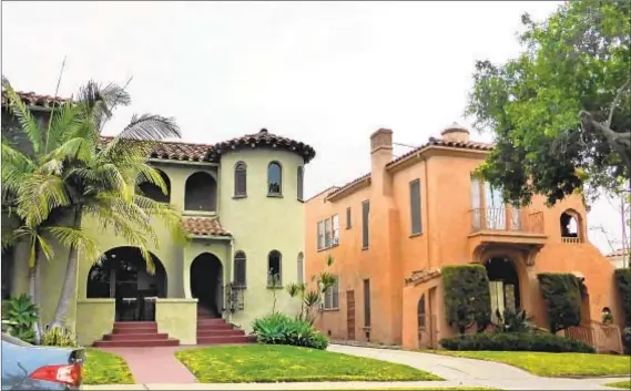  ?? Adrian Scott Fine L.A. Conservanc­y ?? SPANISH COLONIAL Revival architectu­re is dominant in the Carthay Square neighborho­od in west-central Los Angeles.