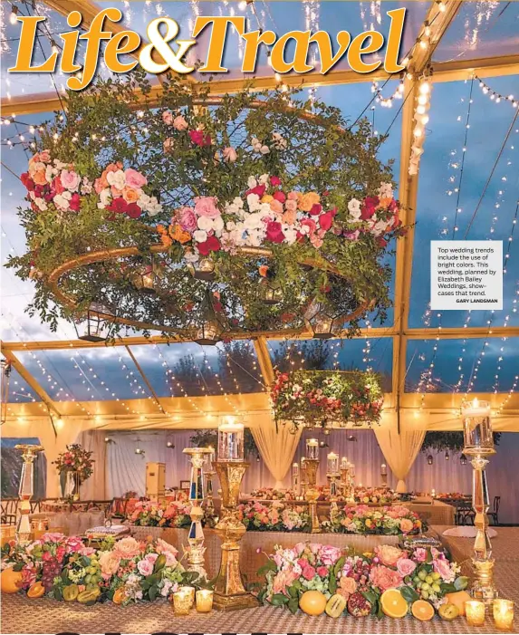  ?? GARY LANDSMAN ?? Top wedding trends include the use of bright colors. This wedding, planned by Elizabeth Bailey Weddings, showcases that trend.