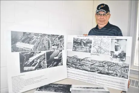  ?? CAROL DUNN/THE NEWS ?? Don Hussher shows displays made by John Ashton with informatio­n pertaining to the first pouring of steel in Trenton.