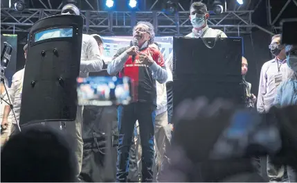  ?? ?? HUMAN SHIELDS: Gustavo Petro, presidenti­al candidate of the Colombia Humana party, speaks during a campaign rally in Cucuta, Colombia, on May 5.