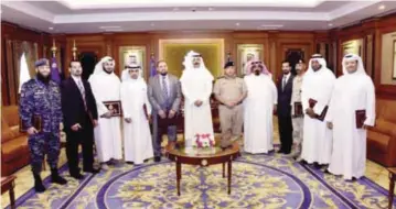  ??  ?? KUWAIT: Deputy Prime Minister and Interior Minister Sheikh Mohammad Al-Khaled AlSabah met recently with the judging committee for the first mixed martial arts tournament for special task forces. Undersecre­tary Lieutenant General Suleiman Al-Fahad and...