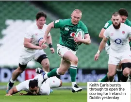  ??  ?? Keith Earls bursts through to open the scoring for Ireland in Dublin yesterday