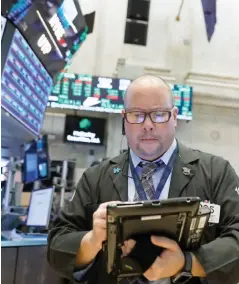  ??  ?? Στη Wall Street ο Dow Jones είχε πτώση 0,52% στην εβδομάδα.