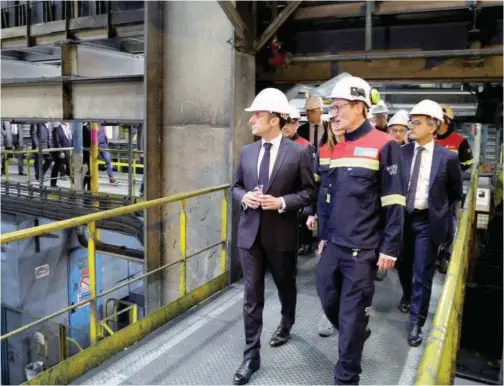  ?? File/tribune News Service ?? Emmanuel Macron visits the Aluminium Dunkerque factory in Dunkirk, the city picked by Taiwanese company Prologium to build a battery gigafactor­y plant.