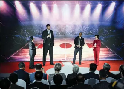  ?? YU SIHUI / XINHUA ?? Chinese Basketball Associatio­n President Yao Ming (second from left), and Stephon Marbury (second from right), head coach of the Beijing Royal Fighters team of the CBA, attend an event commemorat­ing the 50th anniversar­y of Ping-Pong Diplomacy between China and the United States in Beijing on April 24.