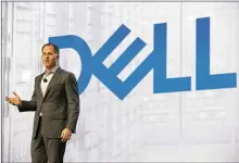  ?? RALPH BARRERA / AMERICANST­ATESMAN ?? Michael Dell gives the keynote speech at the DellEMC/ World conference at the Austin Convention Center on Oct. 19, 2016.