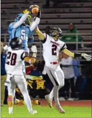  ?? BOB RAINES — DIGITAL FIRST MEDIA ?? North Penn’s Justis Henley intercepts a William Tennent pass Friday night.