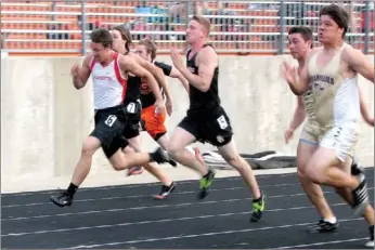  ?? Photograph courtesy of John Mcgee ?? Blackhawks Justin Rouse, Logan Rose, Dayton Winn and Daniel Beard competed in the 100-meter in the district meet Thursday in Gravette.