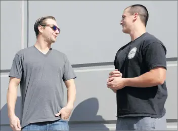  ?? Nikolas Samuels/The Signal ?? Garrett Holcombe, left, and Jesse Heyer meet for the first time after assisting people at the Las Vegas shooting together. The pair, who met for the first time during the incident, are from the Santa Clarita Valley.