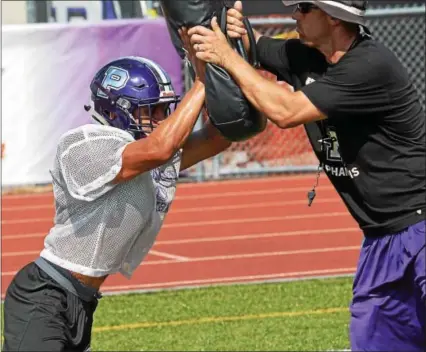  ?? SAM STEWART - DIGITAL FIRST MEDIA ?? Phoenixvil­le’s Matt Garcia returns after a promising 2015season. Here he gets in work during one-on-one blocking drills.