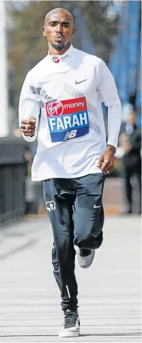  ?? Picture: AFP ?? KEEPING RIGHT IN STEP: Britain’s Mo Farah has been training in Ethiopia, and will look to challenge the UK marathon record in London this weekend