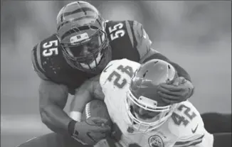  ?? ASSOCIATED PRESS FILE PHOTO ?? Bengals outside linebacker Vontaze Burfict tackles Kansas City Chiefs fullback Anthony Sherman on Aug. 19 in Cincinnati. Burfict has been suspended three games for a hit to the head on Sherman.