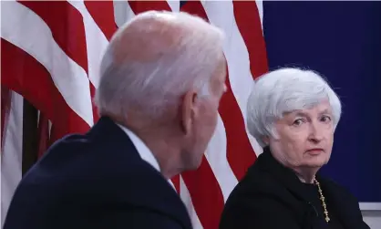  ?? ?? Janet Yellen listens to Joe Biden.
Photograph: Chip Somodevill­a/Getty Images