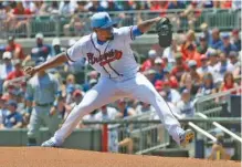  ?? THE ASSOCIATED PRESS ?? Atlanta Braves right-hander Julio Teheran was exceptiona­l in his first start since coming off the disabled list, pitching six no-hit innings in Sunday’s 4-1 win against the San Diego Padres in Atlanta.