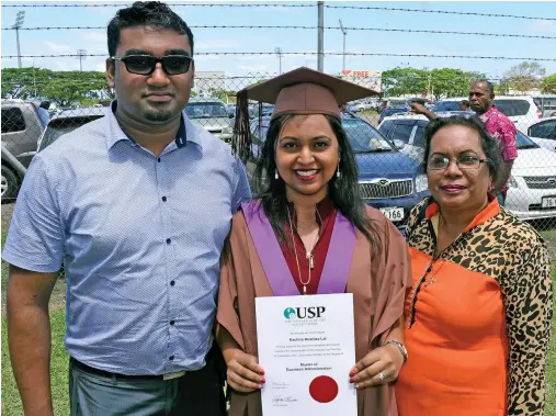  ?? Photo: Vilimoni Vaganalau ?? University of the South Pacific Master of Business Administra­tion graduate Rachna Roshika Lal is flanked by partner Rahul Ravnit Rajesh and her mother Roshni Lal after her graduation at the Vodafone Arena on September 22, 2017.