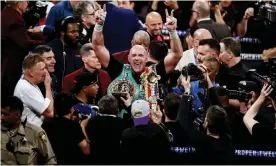  ??  ?? Tyson Fury celebrates after his victory. Photograph: Étienne Laurent/EPA