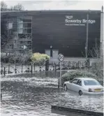  ??  ?? FLASHBACK: Flood water in Brighouse in February 2020, top, pictured by Steven Lord. Middle: In Copley. Photo: The Yorkshire Pudd Blog. Above: In Mytholmroy­d and Sowerby Bridge. Photos: Jade Kilbride.