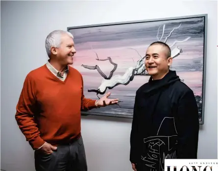  ??  ?? Larry Gagosian and Zeng Fanzhi displayed an easy camaraderi­e and shared a few laughs between takes