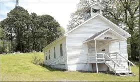  ?? (Submitted photo) ?? A Bella Vista Writing group is getting ready to update the Dug Hill Building, located just off U.S. 71B, near Town Center.