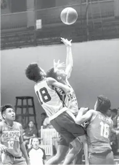  ??  ?? USJ-R’s Kevin Guibao goes up for a rebound during Game 1 of their best-of-three CESAFI Partner’s Cup juniors division finals against SHS-Ateneo last night at the Cebu Coliseum. USJ-R won, 61-56. ALDO NELBERT BANAYNAL