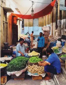  ??  ?? Walking through the Empress Market on any given day is an assault on the senses, from the smells of freshly cut mint leaves and burning joss sticks, to the sounds of boisterous merchants and chirping birds.