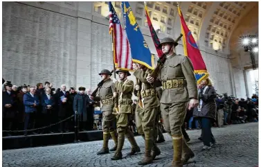  ?? VIRGINIA MAYO / ASSOCIATED PRESS ?? Re-enactors dressed in U.S. World War I uniforms march during an Armistice ceremony at the Menin Gate in Ypres, Belgium, on Sunday. Sunday marked exactly 100 years since the end of World War I.